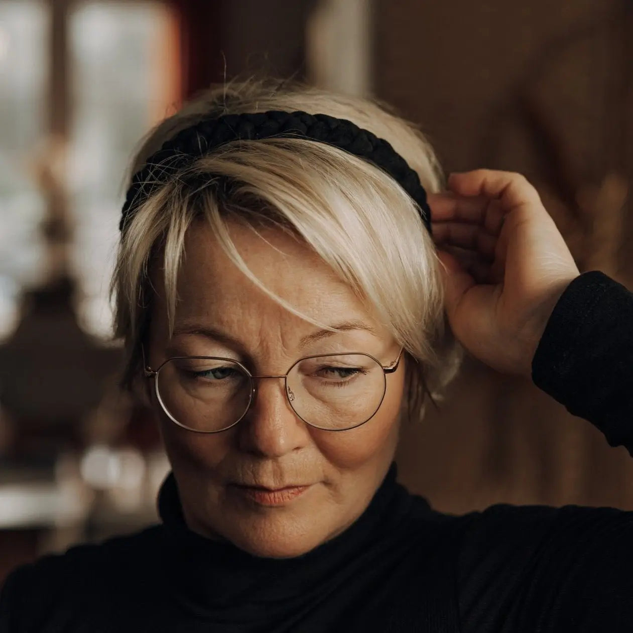 Bella- schwarz Haarreif geflochten